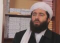 انصاري: څوک چې د نظام پر ضد درېږي باید سر یې غوڅ شي