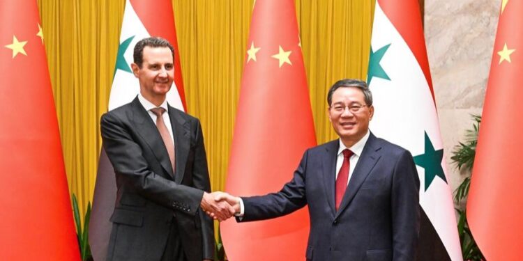لي چيانګ د سوريې له ولسمشر بشار الاسد سره وکتل